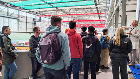students having a tour of an industrial building