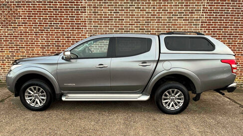 Mitsubishi Warrior L200 against a wall